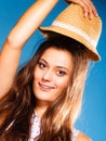 Happy girl in summer clothes and straw hat. Royalty Free Stock Photo