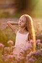 Happy girl or summer forest park open arms with happiness, hope and vitality. Caucasian girl relaxing and enjoying life on nature Royalty Free Stock Photo