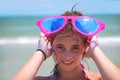 Happy Girl with Sunglasses at the Beach Royalty Free Stock Photo