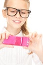 Happy girl taking picture with cell phone Royalty Free Stock Photo