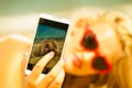 Happy girl taking self picture with smartphone Royalty Free Stock Photo