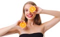 Happy girl with two half orange on white isolated background Royalty Free Stock Photo