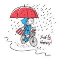 Happy girl under red umbrella rides bicycle Royalty Free Stock Photo