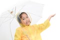 Happy girl is wearing yellow raincoat Royalty Free Stock Photo