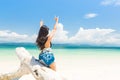 Happy girl on White sand beach and Long-tail boat at Khang Khao Island Bat island, The beautiful sea Ranong Province, Thailand Royalty Free Stock Photo