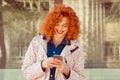 Happy girl woman reading text message on mobile phone Royalty Free Stock Photo