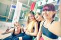 Happy girlfriends group taking selfie in gym dressing room Royalty Free Stock Photo