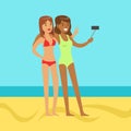 Happy girlfriends taking selfie against a bright blue sky and sea Royalty Free Stock Photo