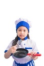 Happy girls with amazing smile in clothes and chef cap. child dreams of becoming a chef