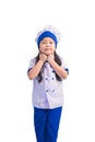 Happy girls with amazing smile in clothes and chef cap. child dreams of becoming a chef Royalty Free Stock Photo