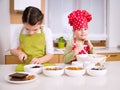 Happy girls cooking together