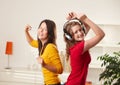 Happy girls dancing to music Royalty Free Stock Photo