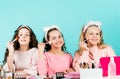 Happy girls doing makeup together. Sisterhood happiness. Cosmetics shop. Cosmetics for children. Beauty and fashion Royalty Free Stock Photo