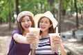 Girls drinking bubble tea and enjoy summer vacation