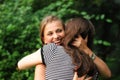 Happy girls embracing Royalty Free Stock Photo