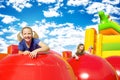 Happy Girls on Inflate Castle Royalty Free Stock Photo