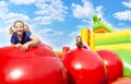 Happy Girls on Jupming Castle During Sunny Day Royalty Free Stock Photo