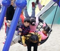 Girls play happily on big net swing, adobe rgb