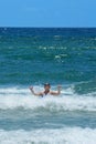 Happy girls playing in beautiful ocean. Royalty Free Stock Photo