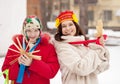 Happy girls plays during Shrovetide