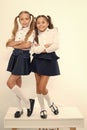 Happy girls smile in school uniform. Back to school. Pretty dresses little curls, thank heaven for little girls