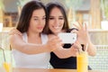 Happy Girls Taking a Selfie Together Royalty Free Stock Photo