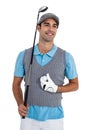 Happy golf player standing with golf ball and golf club