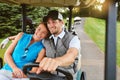 Happy golfers. an affectionate young couple spending a day on the golf course. Royalty Free Stock Photo