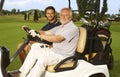 Happy golfers in golf cart Royalty Free Stock Photo