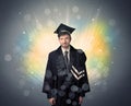 Happy graduate with colorful bokeg lights in the background