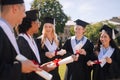 Happy graduates talking about their future plans. Royalty Free Stock Photo