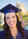 Happy Graduating Mixed Race Teen In Cap and Gown