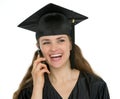 Happy graduation student woman speaking phone Royalty Free Stock Photo
