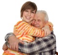 Happy grandchild hugs a happy grandad Royalty Free Stock Photo