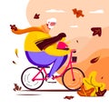 Happy granddad with his granddaughter are riding bikes in autumn park Royalty Free Stock Photo