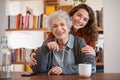 Happy granddaughter embracing senior grandmother Royalty Free Stock Photo