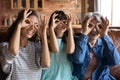 Happy granddaughter girl, mother, grandmother having fun at home together Royalty Free Stock Photo