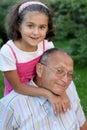Happy grandfather ang kid outdoors Royalty Free Stock Photo