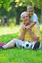 Happy grandfather and child in park Royalty Free Stock Photo