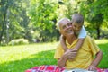 Happy grandfather and child in park Royalty Free Stock Photo