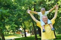 Happy grandfather and child in park Royalty Free Stock Photo