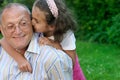 Happy grandfather and granddaughter