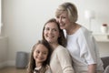 Happy grandma, adult mom and cute daughter child standing close Royalty Free Stock Photo