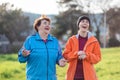 Happy grandmother and adult granddaughter have fun talking. Family time. Outdoor. International Day of Older Persons