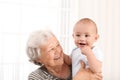 Happy grandmother with little baby Royalty Free Stock Photo