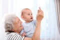 Happy grandmother with little baby Royalty Free Stock Photo