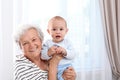 Happy grandmother with little baby Royalty Free Stock Photo