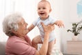 Happy grandmother with little baby Royalty Free Stock Photo