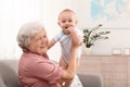 Happy grandmother with little baby Royalty Free Stock Photo