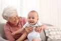 Happy grandmother with little baby Royalty Free Stock Photo